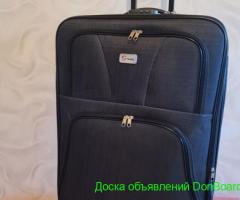Продам новый БОЛЬШОЙ чемодан на 4 колесиках.